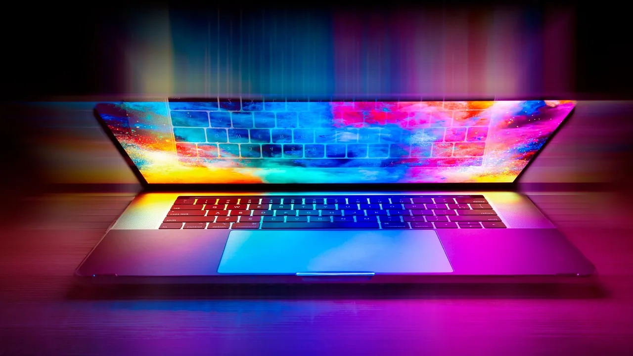 Portátil con fondo vibrante y luminoso, representando un entorno creativo ideal para un curso de IA.